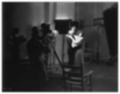 1928: Swedish born American actress Greta Garbo (1905 - 1990) and John Gilbert (1899 - 1936) during the filming of 'A Woman of Affairs'