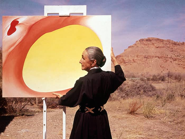 01 Jan 1960 | Georgia O'Keeffe With Painting In Desert, NM