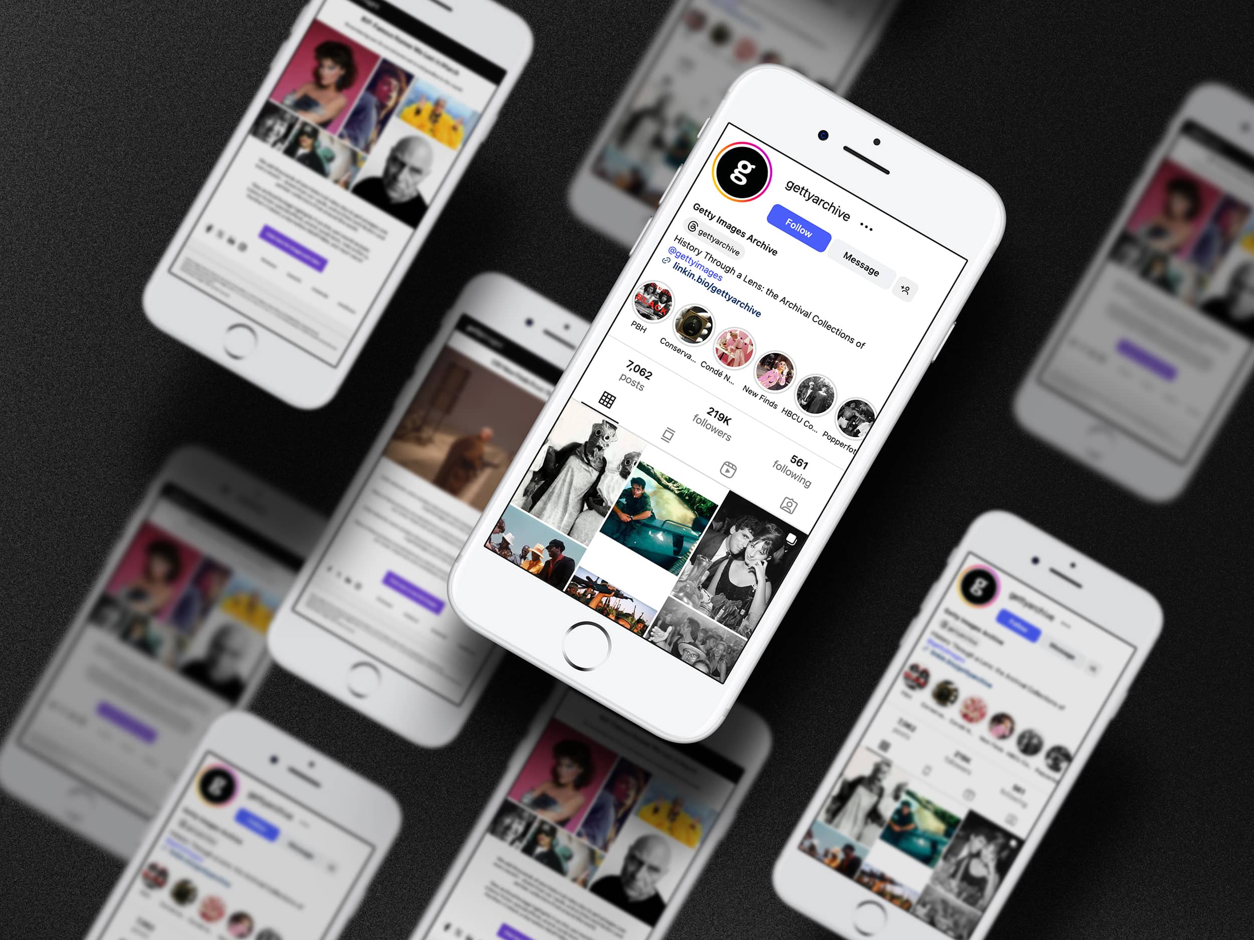 An image of several floating phones displaying Getty Images Instagram and Archive newsletters.