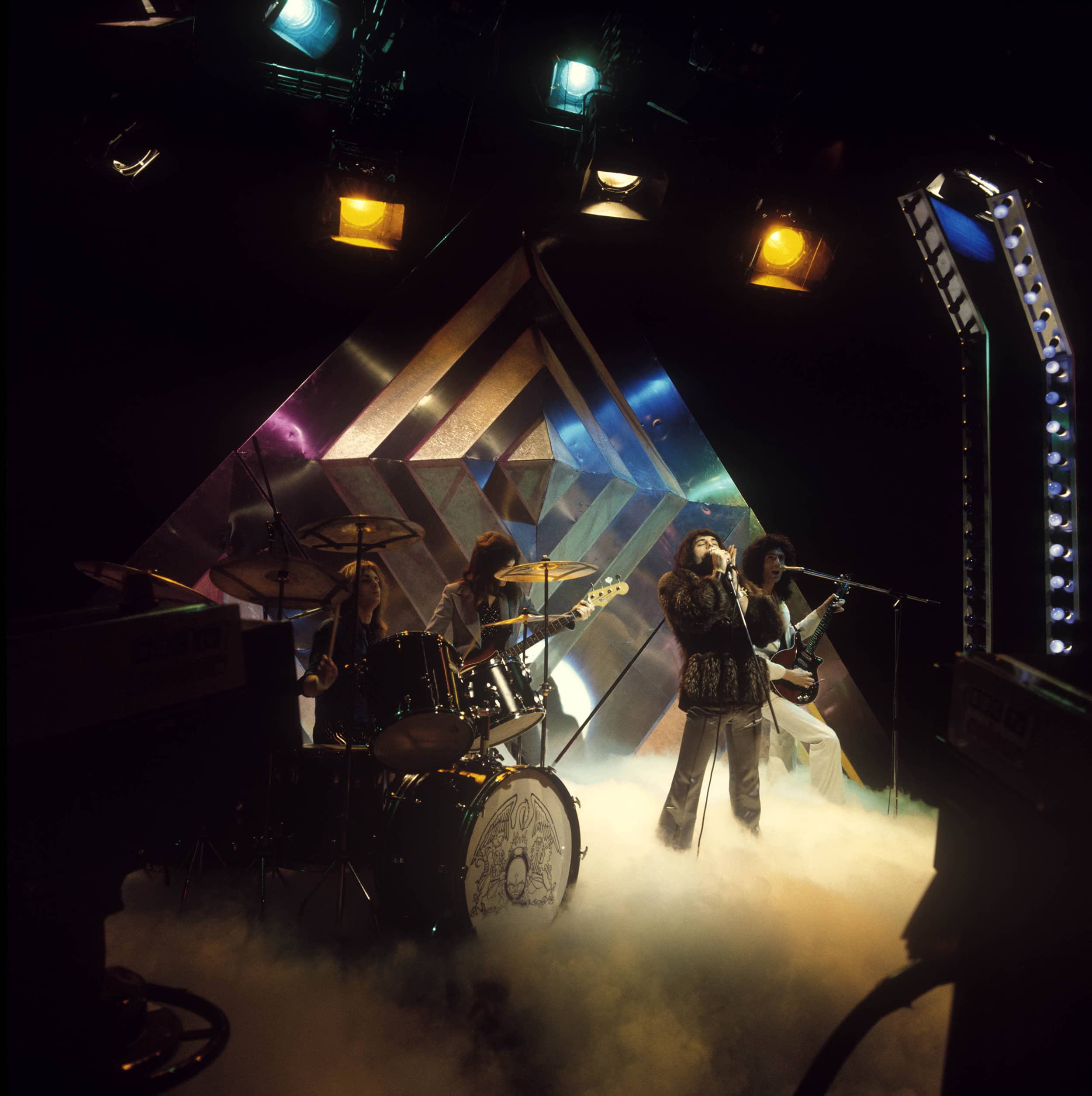 English rock group Queen perform their new single 'Killer Queen' on the BBC Television music show 'Top Of The Pops' at BBC Television Centre in London in October 1974.